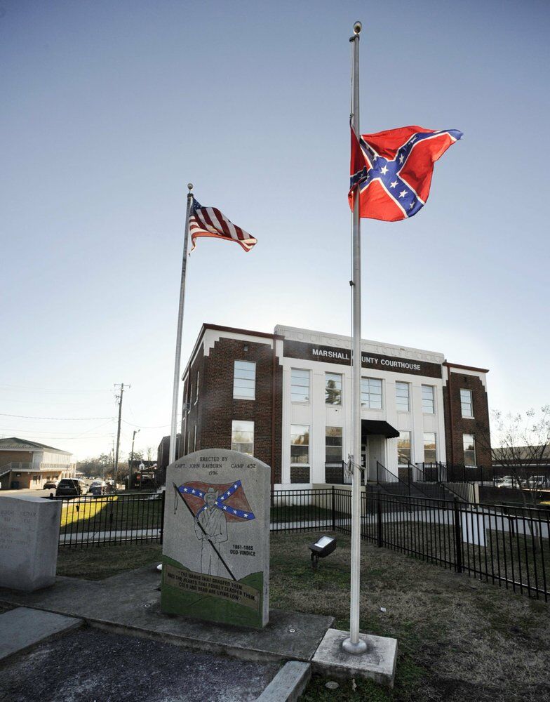 A Confederate monument and rebel battle flag